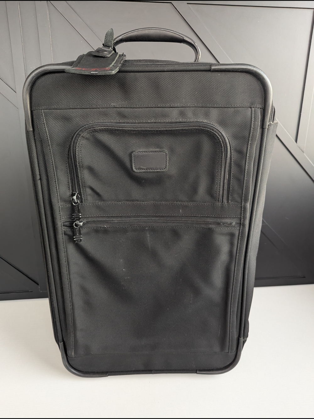 Tumi Black Men’s Carry-On Rolling Travel Bag